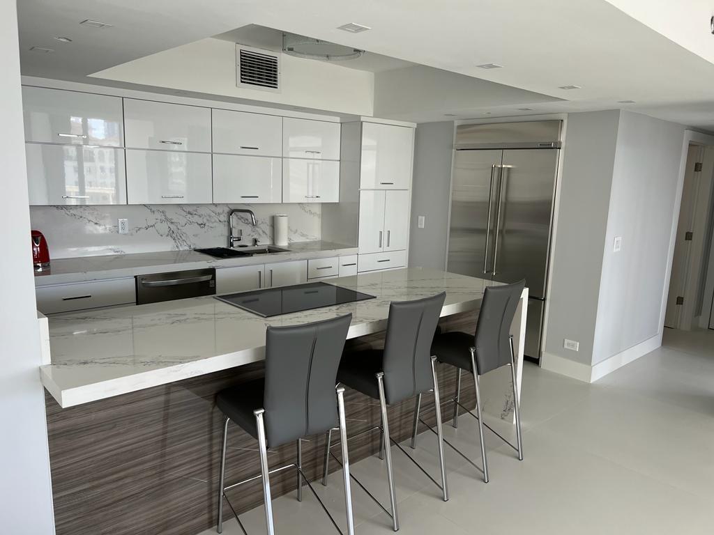 Dark modern custom kitchen remodel in Miami